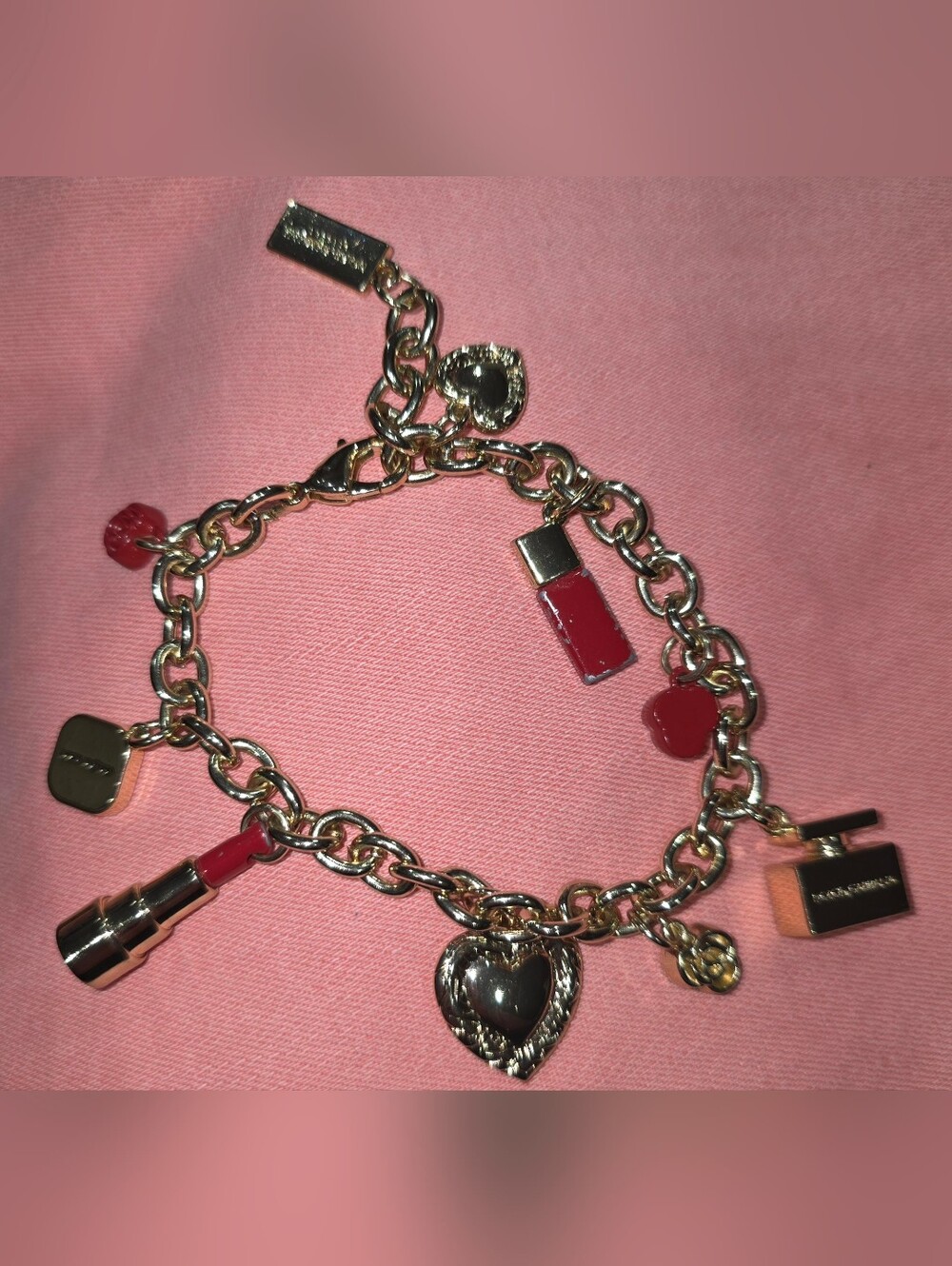 Vintage Dolce & Gabbana Gold Charm Bracelet with Red Enamel Accents